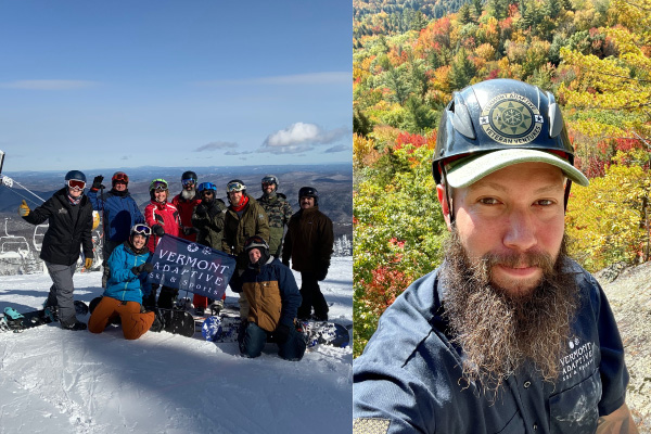 A group photo of ski and snowboarders pose at the top of a ski mountain holding a flag with the Vermont Adaptive logo